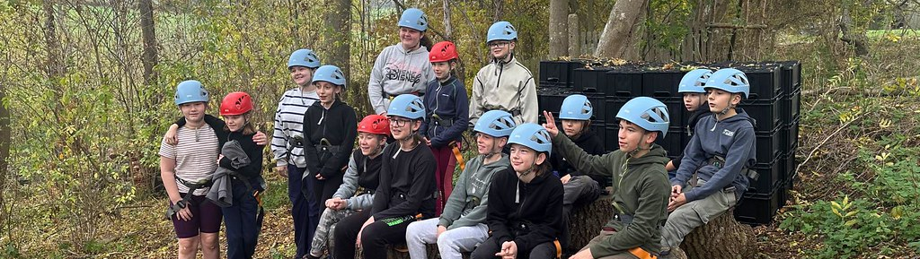 Image of Scouts at an outdoor activity in the woods